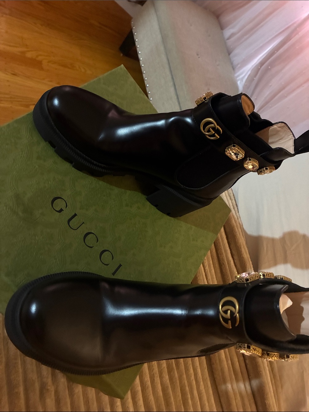 Gucci Black Leather Ankle Boots with Gold GG and Buckle Accents